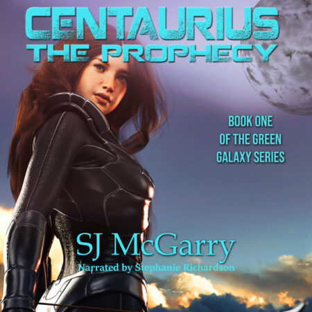 A woman in black and white is standing on the beach.